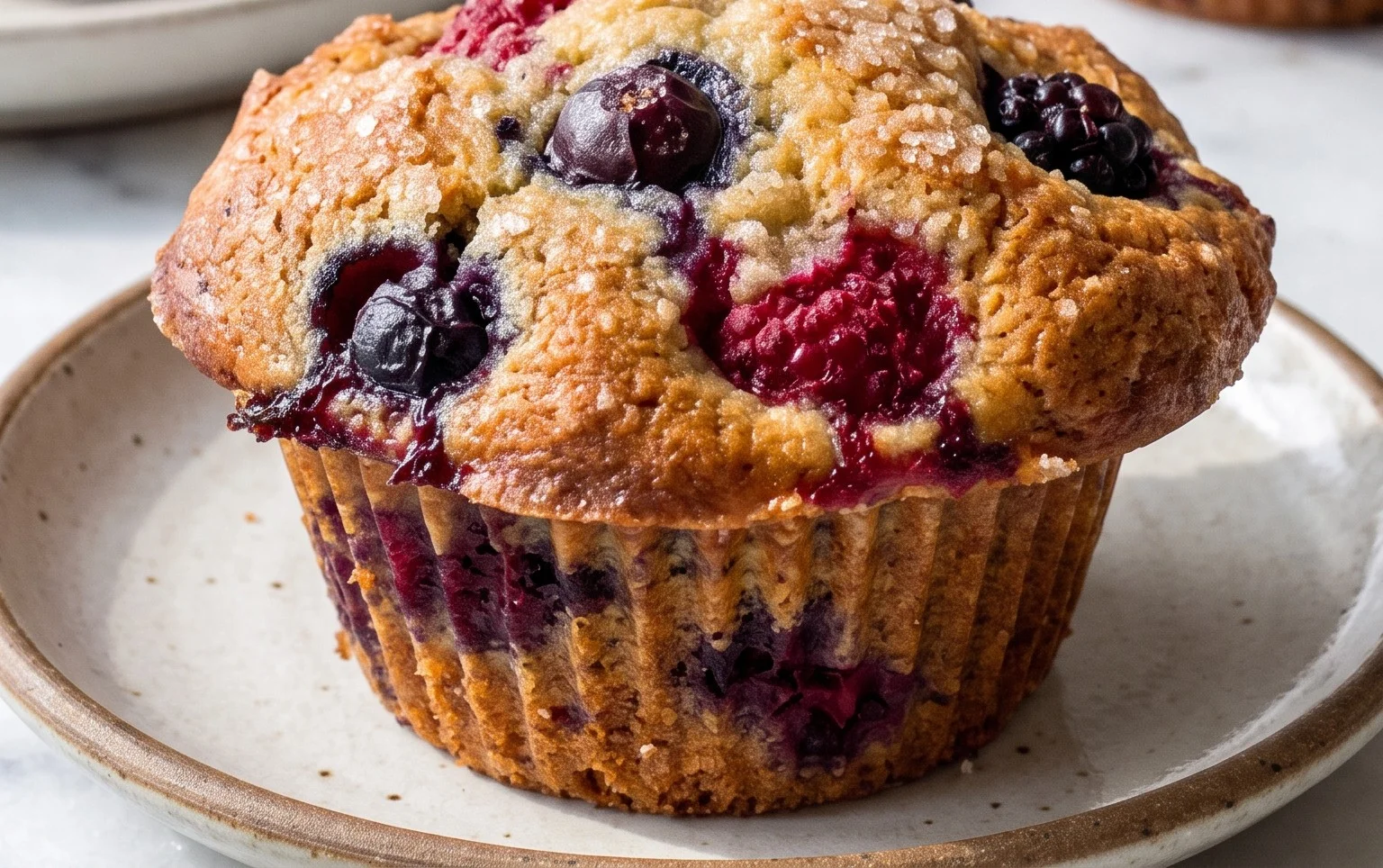 Bakery Style Mixed Berry Muffins | with Frozen Berries